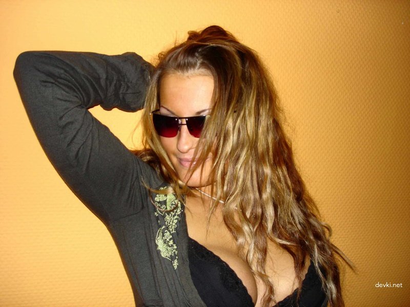Bronzed Woman Flaunts Her Assets: Explicit Amateur Photo