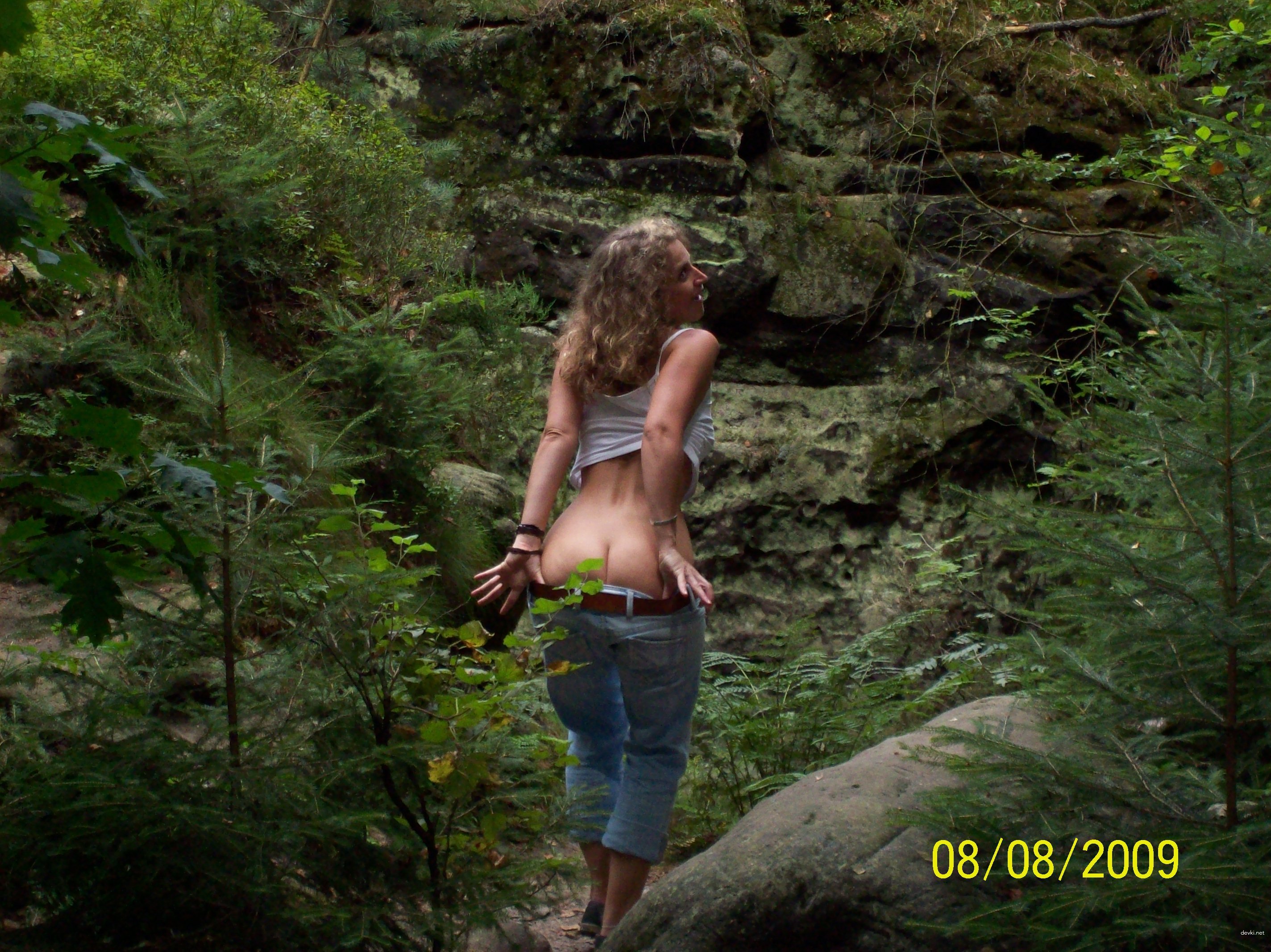 Amateur Photo Reveals Bare Breasts in Provocative Display