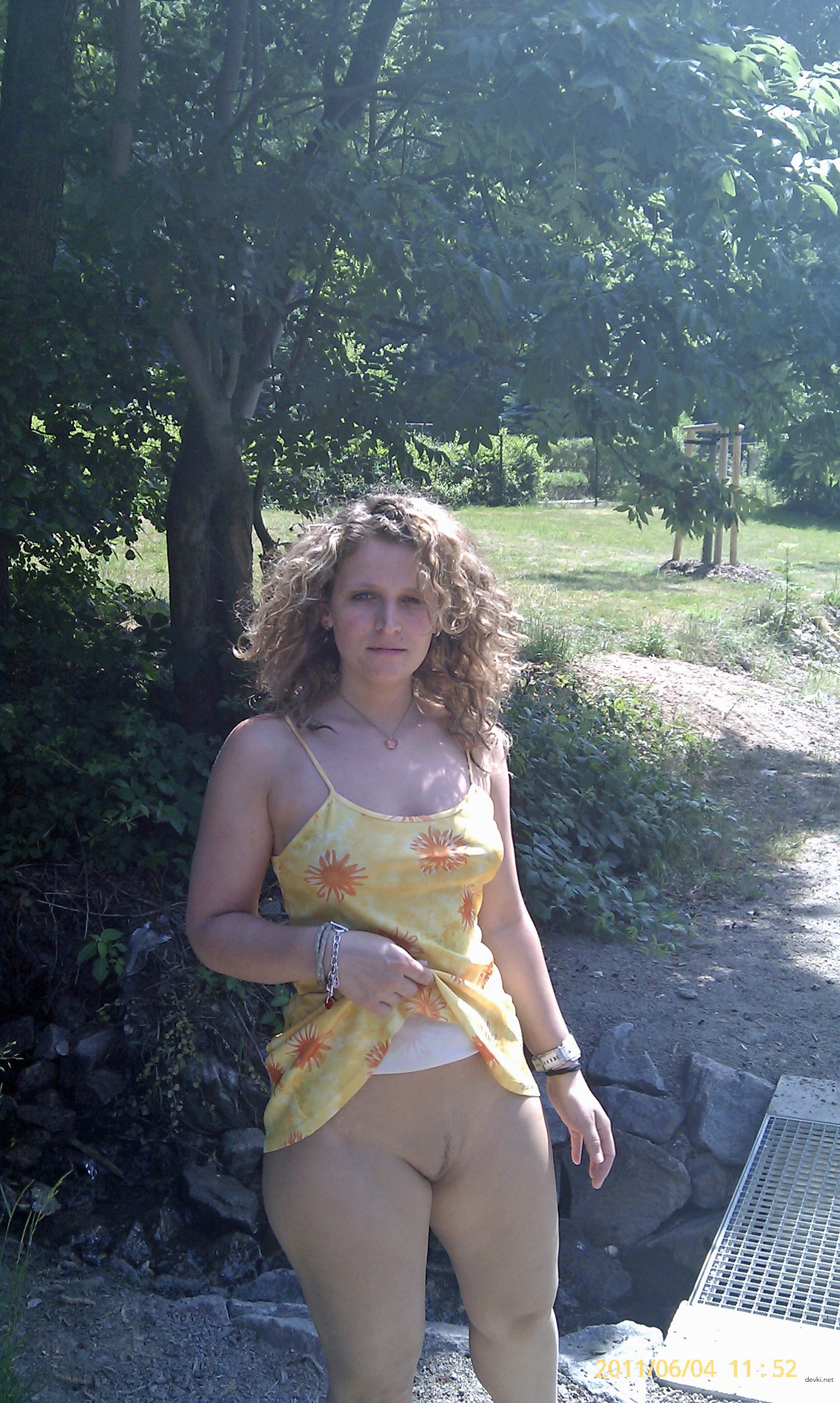 Amateur Photo Reveals Bare Breasts in Provocative Display