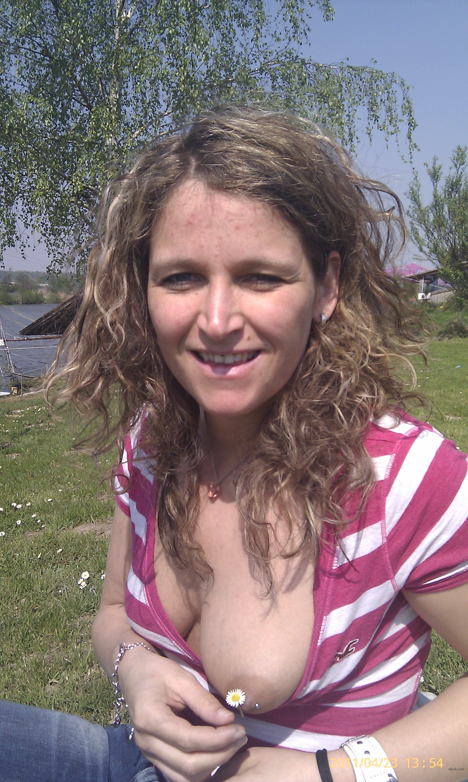 Amateur Photo Reveals Bare Breasts in Provocative Display