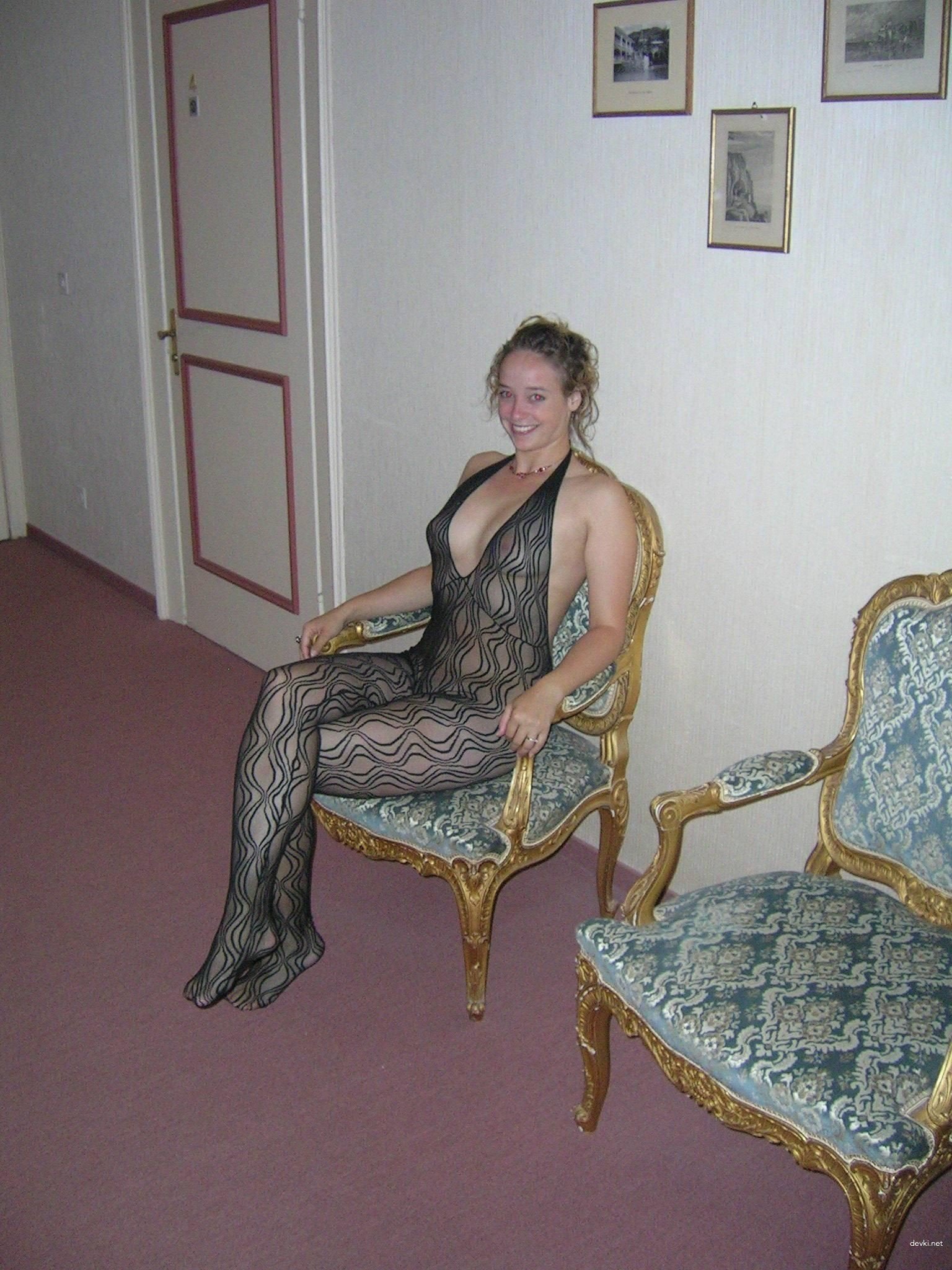 Curly-Haired Babe Shows Off in Amateur Photo - Explicit Content
