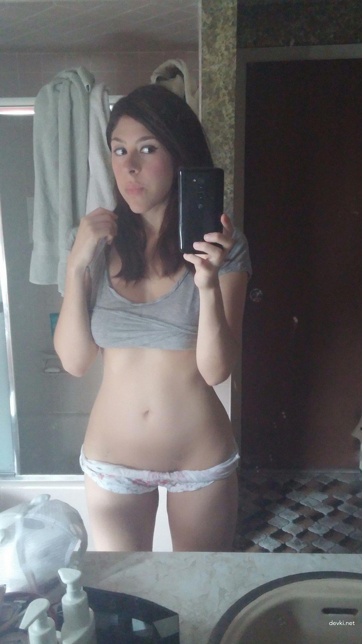 Naked Busty Amateur Babe with Curvy Figure Exposed