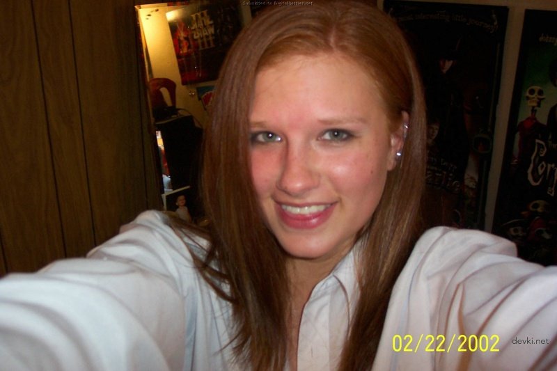 Fiery Redhead Gives Blowjob: Hardcore Oral Sex Photo