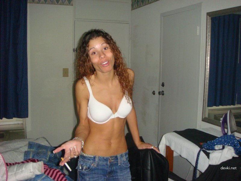 Curly-haired Babe Loves Giving Blowjob - Explicit Oral Sex Photo