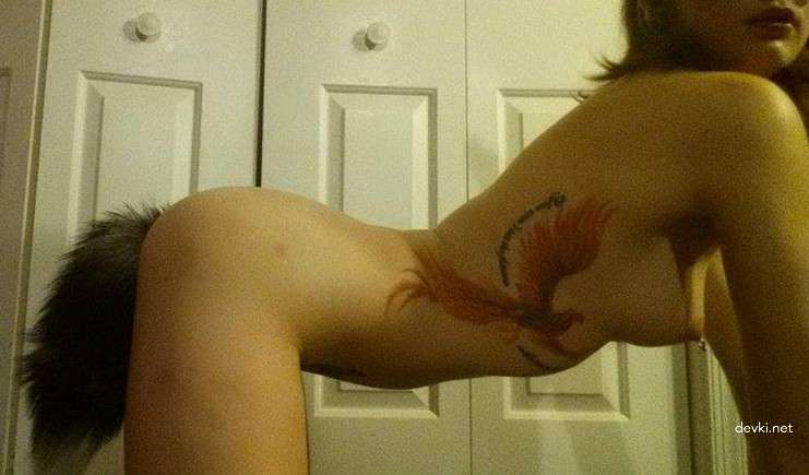 Naked Slut with Tail in Ass - Explicit Amateur Photo Collection