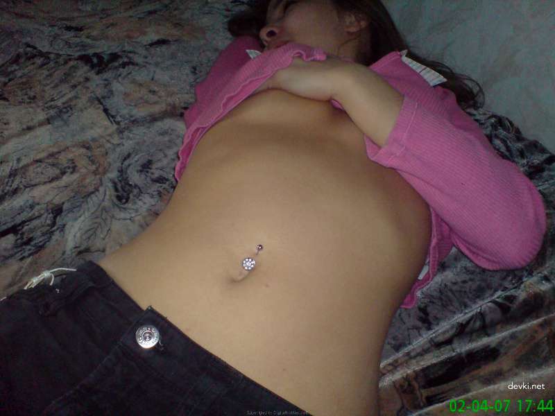 Explicit Amateur Photo: Sexy Girl Poses on Bed for Erotic Photoshoot