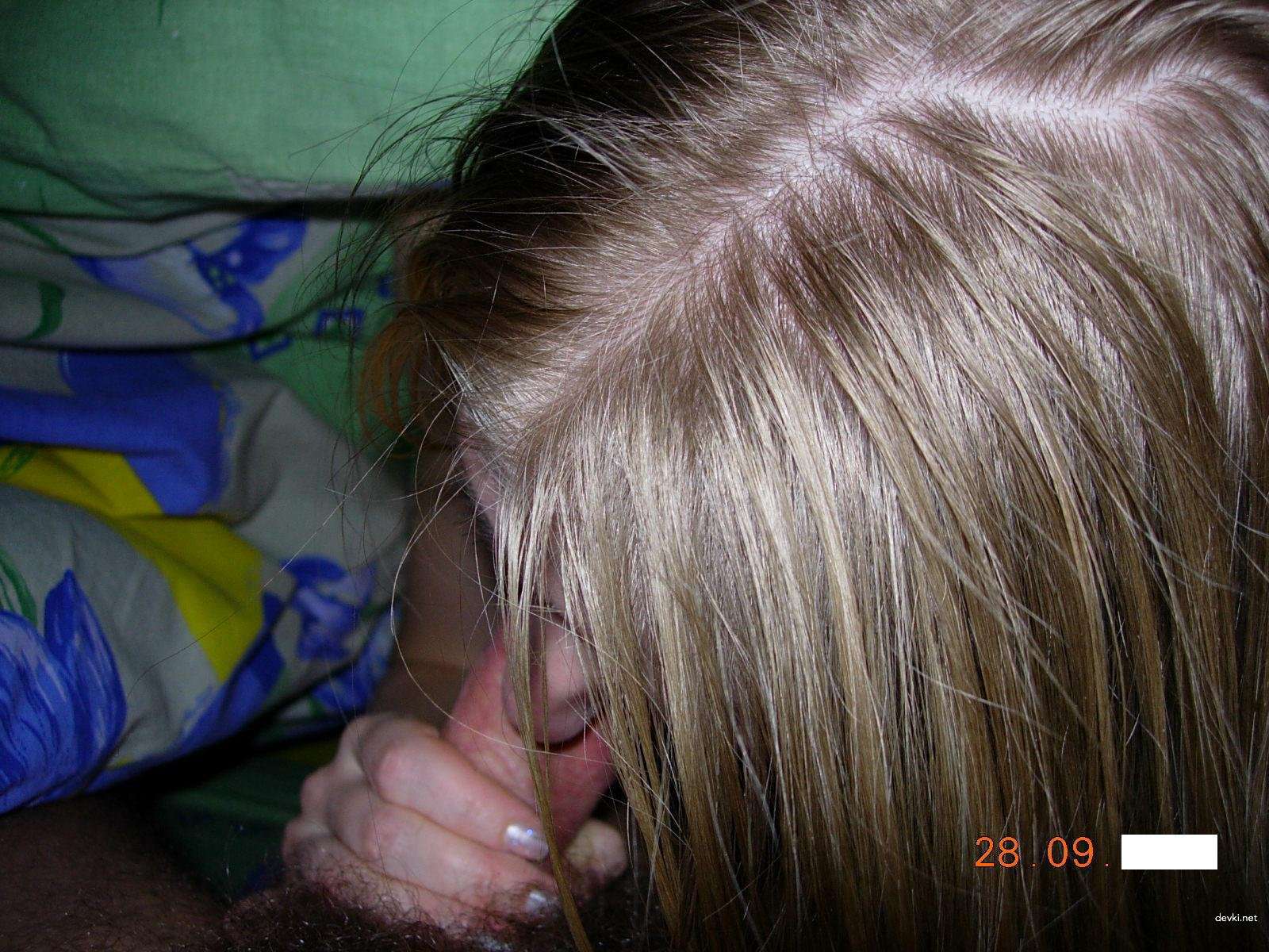 Skinny slut gives blowjob - explicit oral sex photo.