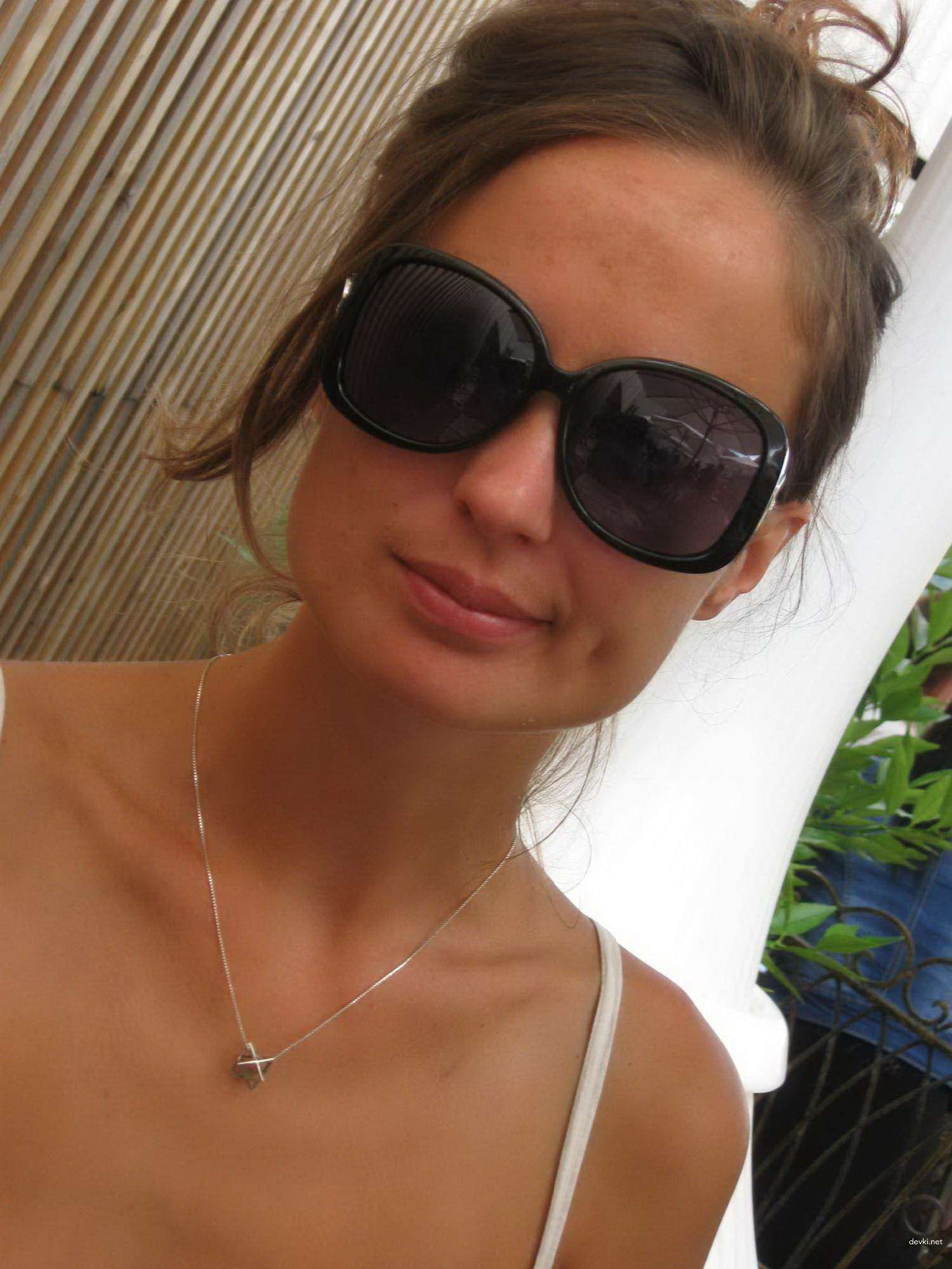 Topless Woman Poses Boldly on Vacation - Amateur Explicit Photo