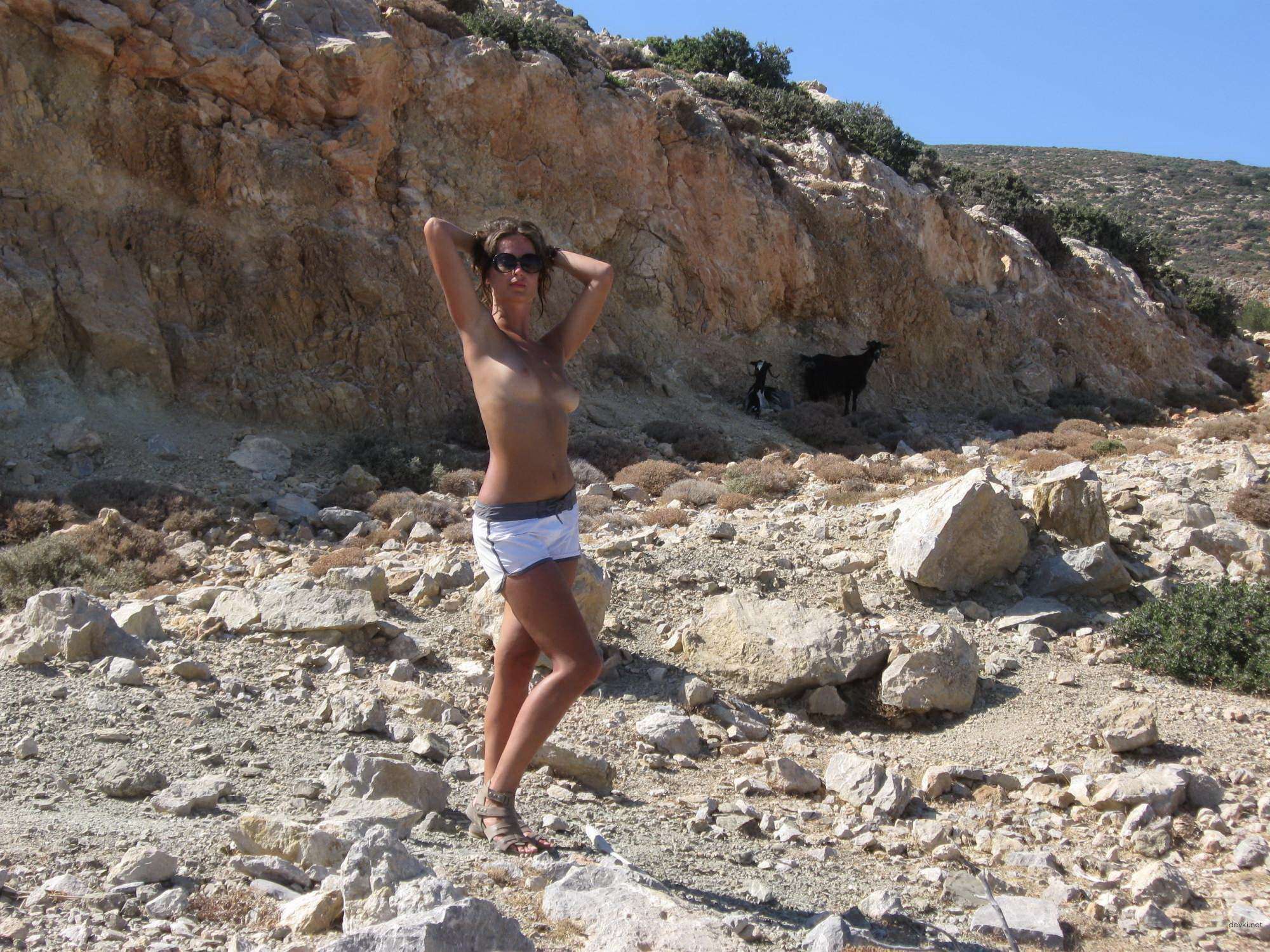 Topless Woman Poses Boldly on Vacation - Amateur Explicit Photo