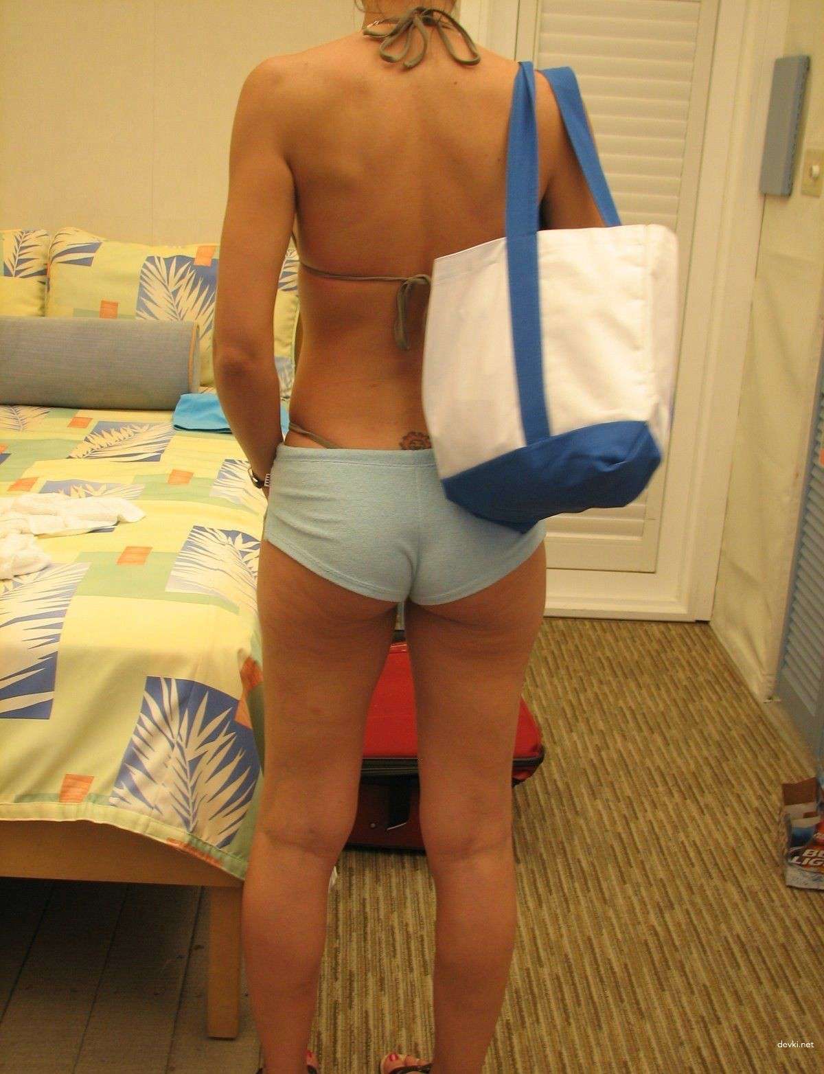 Brunette's Explicit Beach Photo Diary: Uncensored Shots from the Sea.