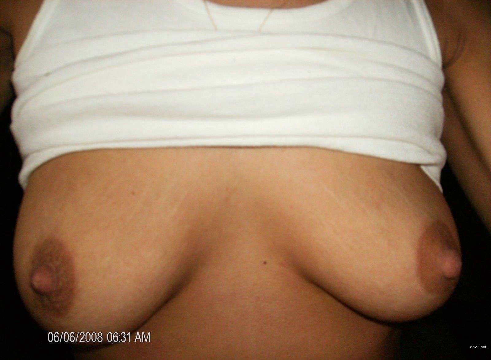 Brunette's Explicit Beach Photo Diary: Uncensored Shots from the Sea.