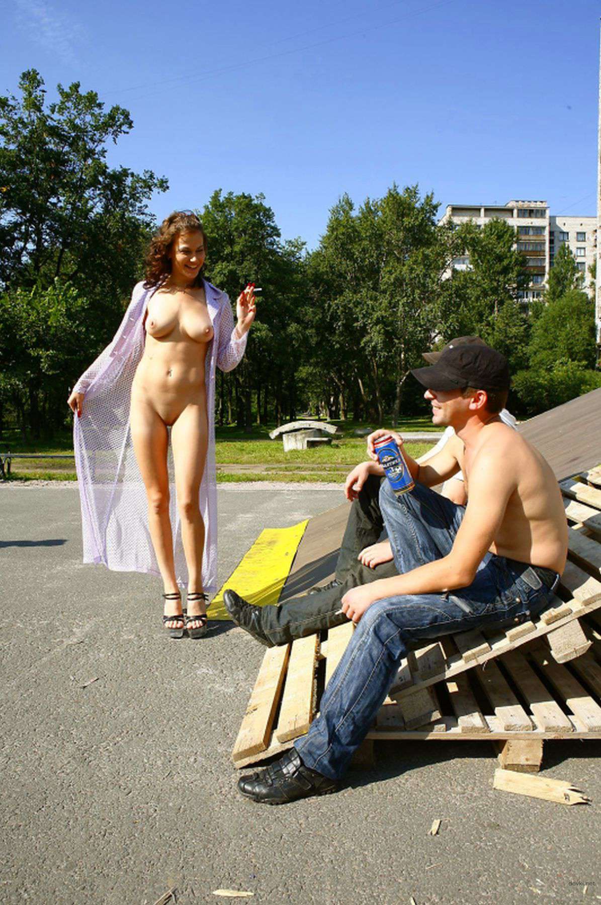 Curly Girl Walks Naked: Amateur Photo with Explicit Nudity