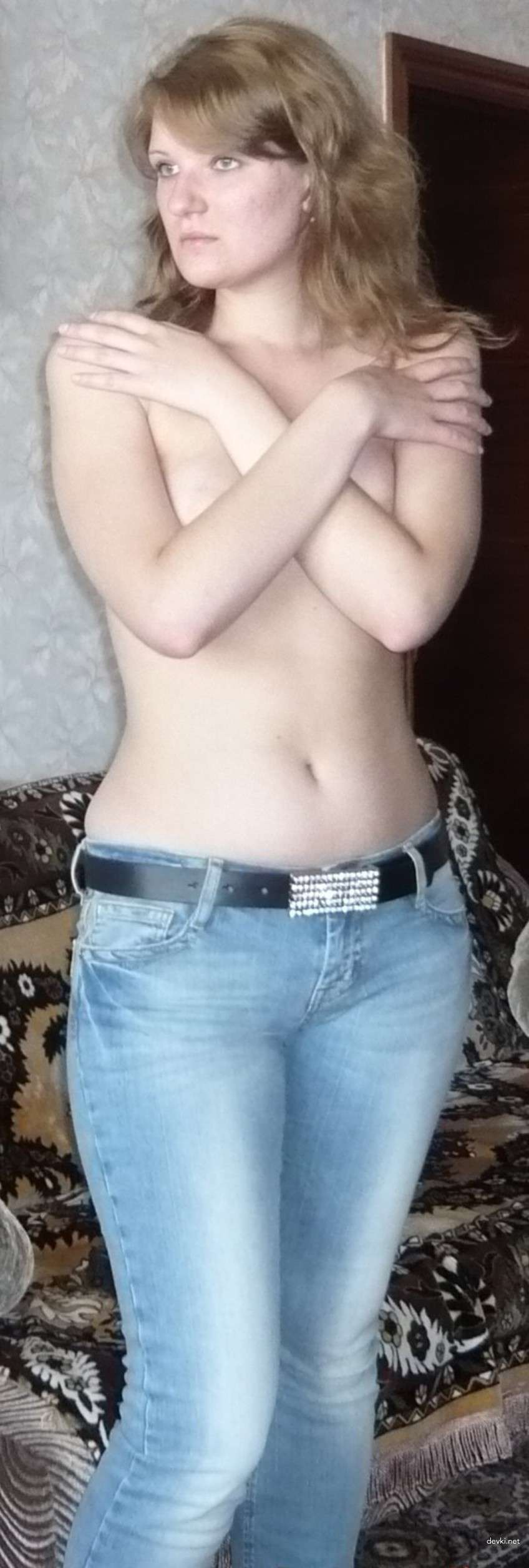 Russian Amateur Erotica: Explicit Home Photos of a Seductive Girl