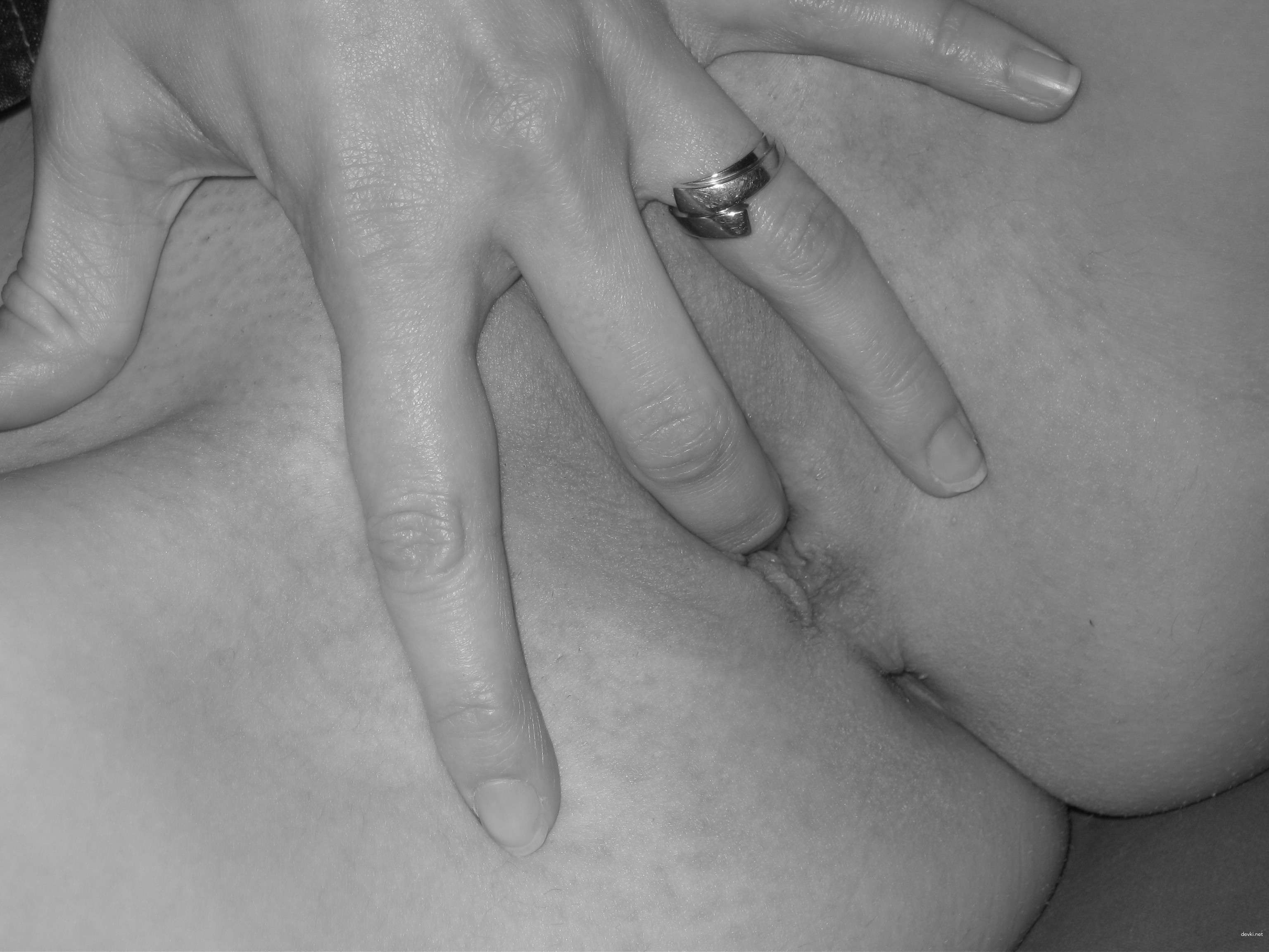 Hot girl engaging in explicit sex act - XXX Porn Photo