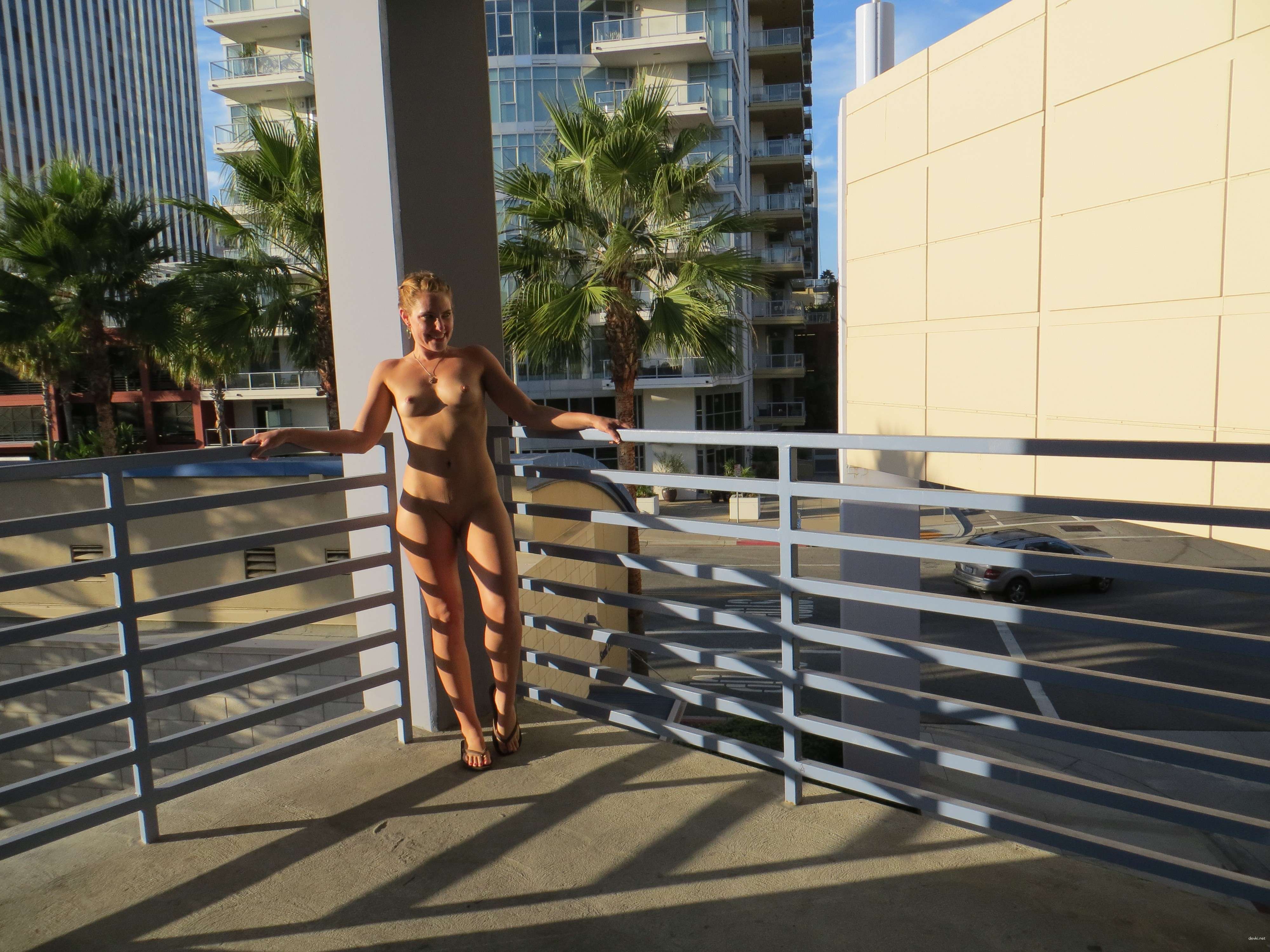 Public Flashing: Busty Girl Shows Off Her Assets in the City