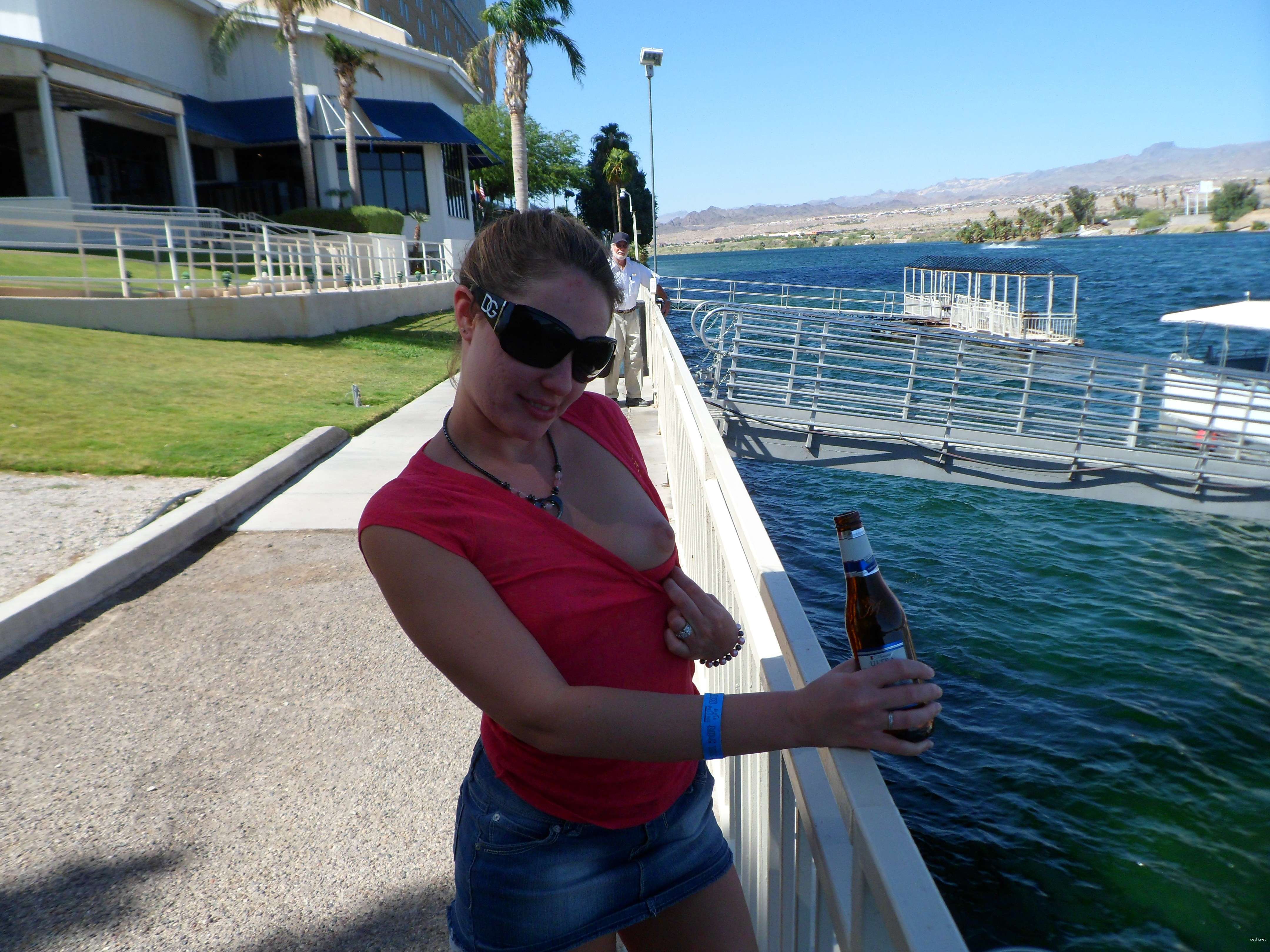 Public Flashing: Busty Girl Shows Off Her Assets in the City
