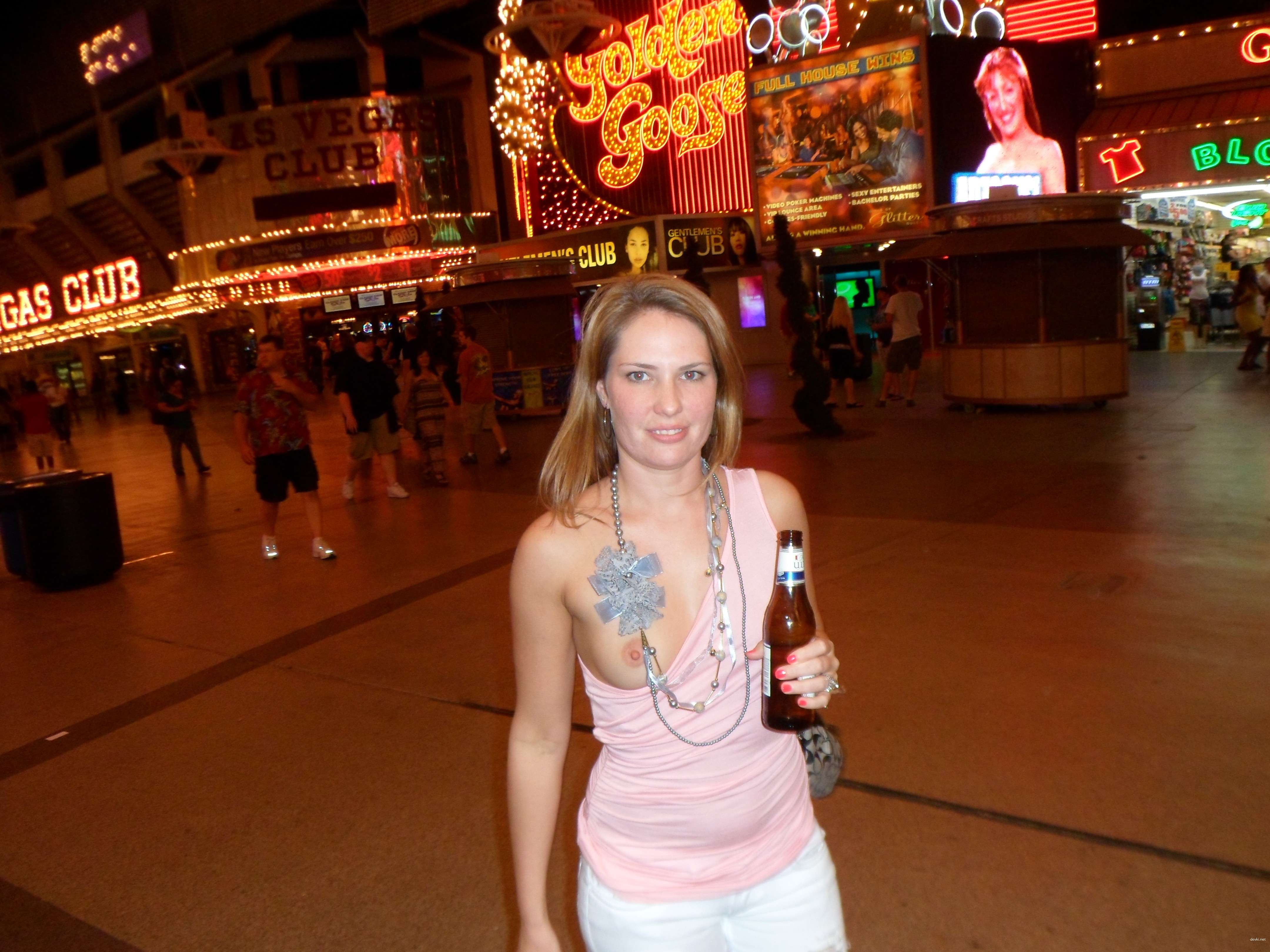 Public Flashing: Busty Girl Shows Off Her Assets in the City