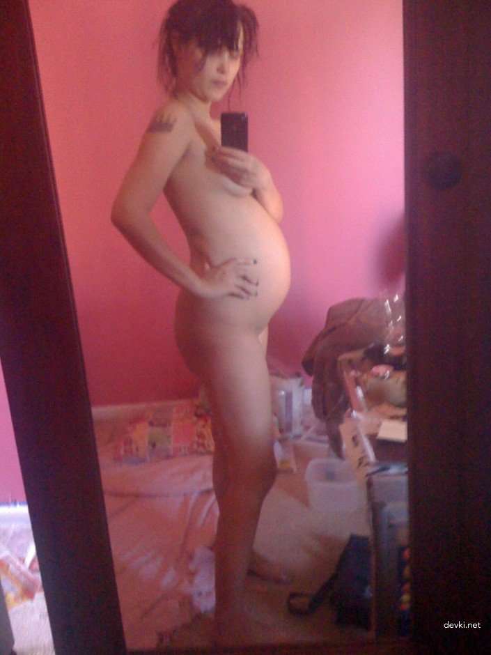 Pregnant Brunette's Explicit Selfie: Amateur Photo with Bold Nudity