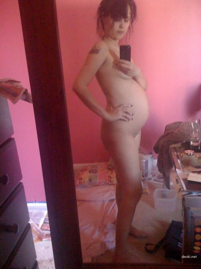 Pregnant Brunette's Explicit Selfie: Amateur Photo with Bold Nudity