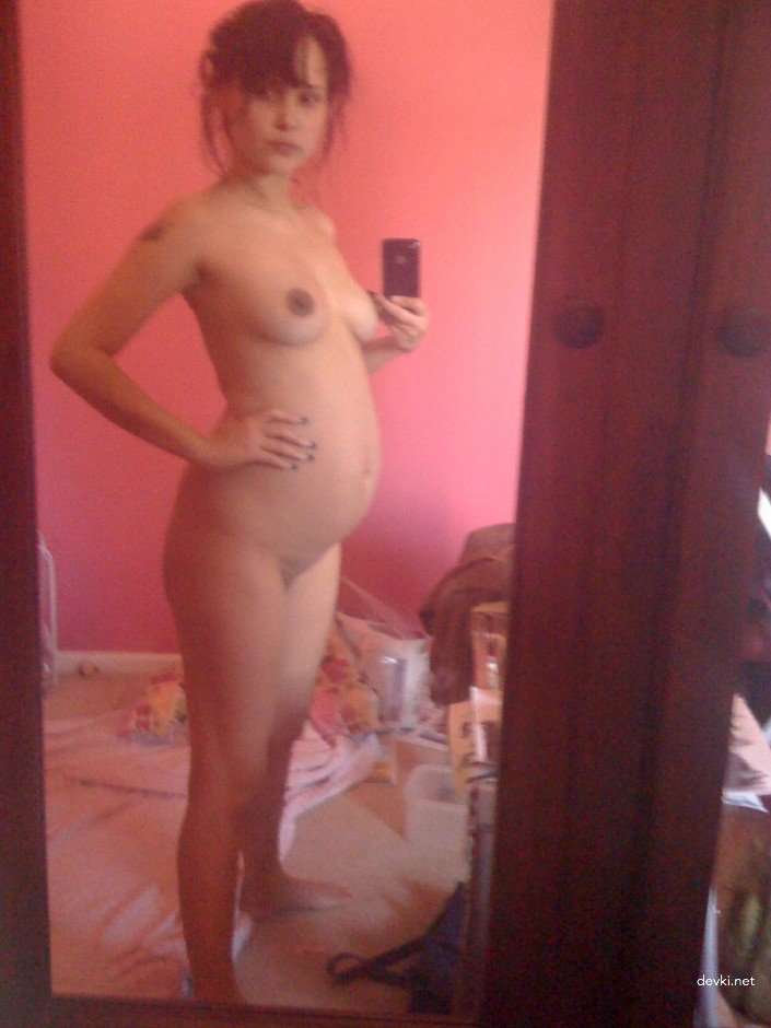 Pregnant Brunette's Explicit Selfie: Amateur Photo with Bold Nudity