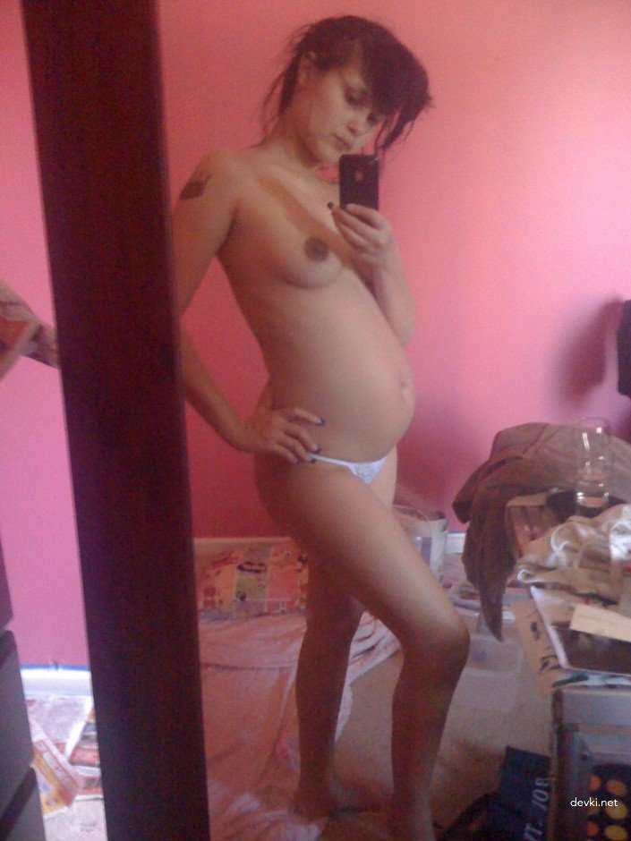 Pregnant Brunette's Explicit Selfie: Amateur Photo with Bold Nudity