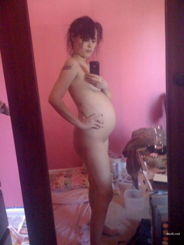 Pregnant Brunette's Explicit Selfie: Amateur Photo with Bold Nudity
