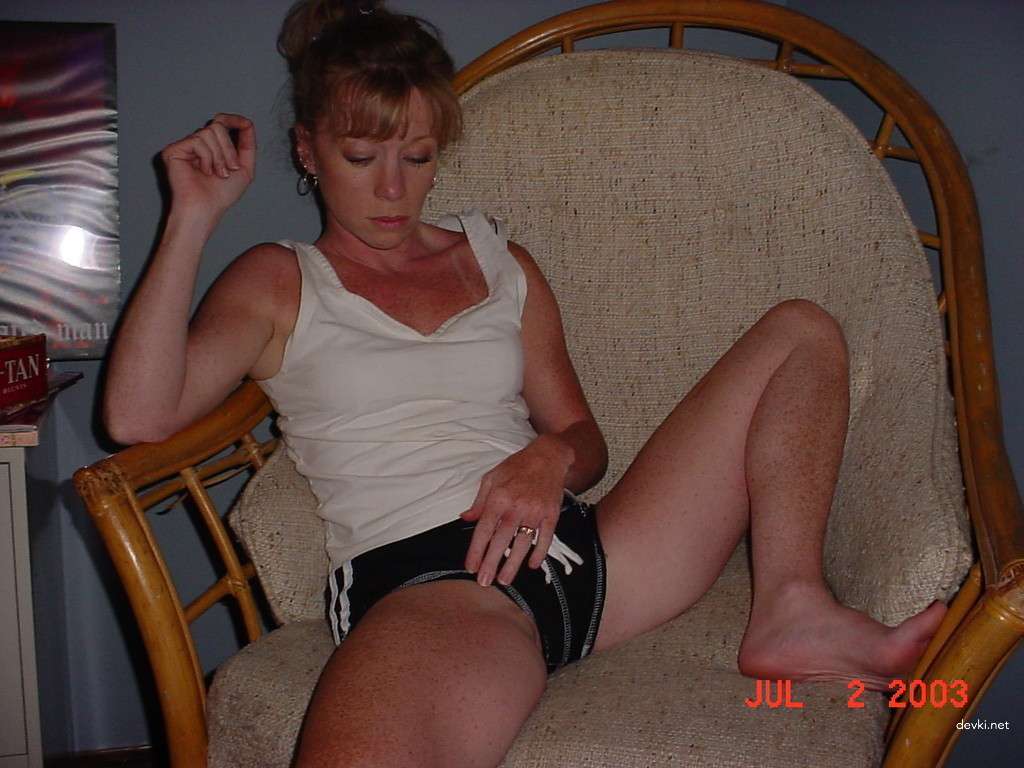 Mature MILF Anal Bottle Insertion: Extreme Anal Play and MILF Porn Photo