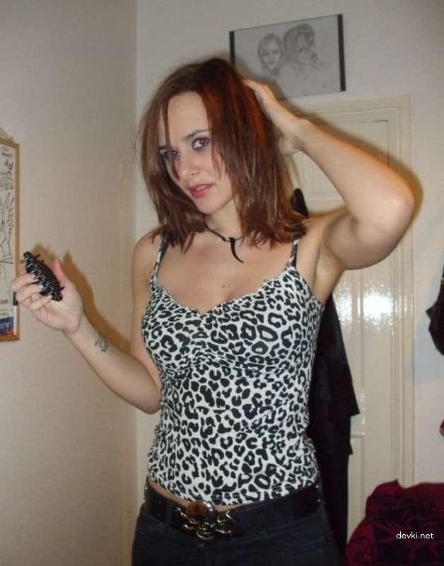 Amateur Babe Strips Erotically on Camera for Explicit Photoshoot