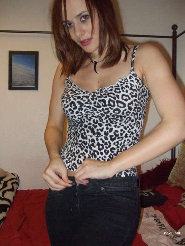 Amateur Babe Strips Erotically on Camera for Explicit Photoshoot