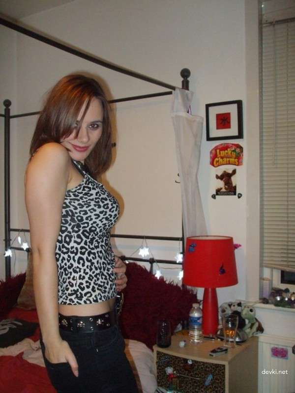 Amateur Babe Strips Erotically on Camera for Explicit Photoshoot