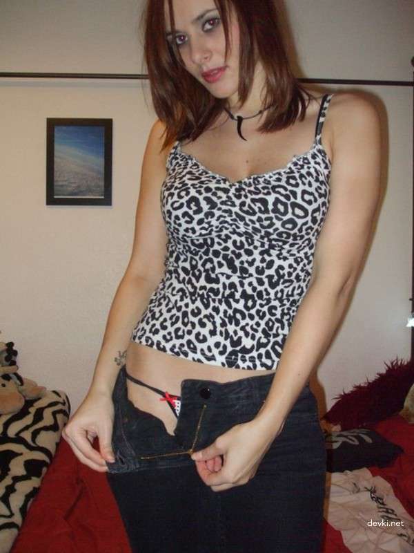 Amateur Babe Strips Erotically on Camera for Explicit Photoshoot