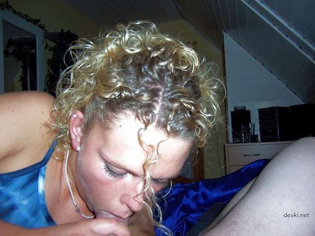 Curly Haired Slut Drenched in Cum - Explicit Bukkake Porn Photo