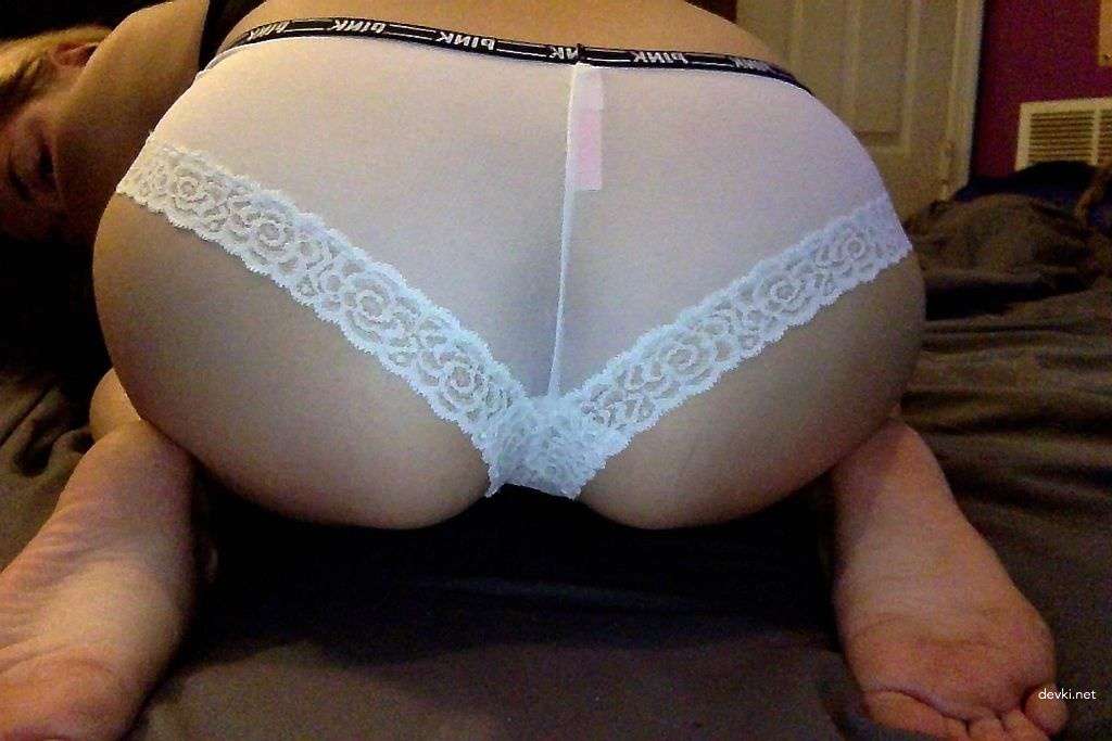 Explicit Amateur Photos: Girl with Shaved Pussy Exposing Herself at Home