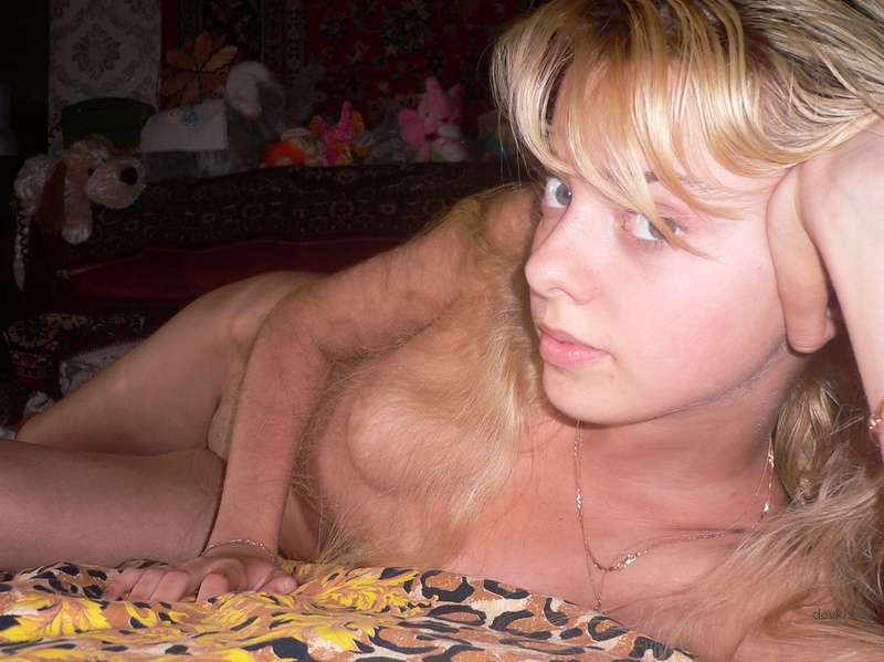 Sultry Amateur Babe Poses at Home - Hot and Explicit Selfies