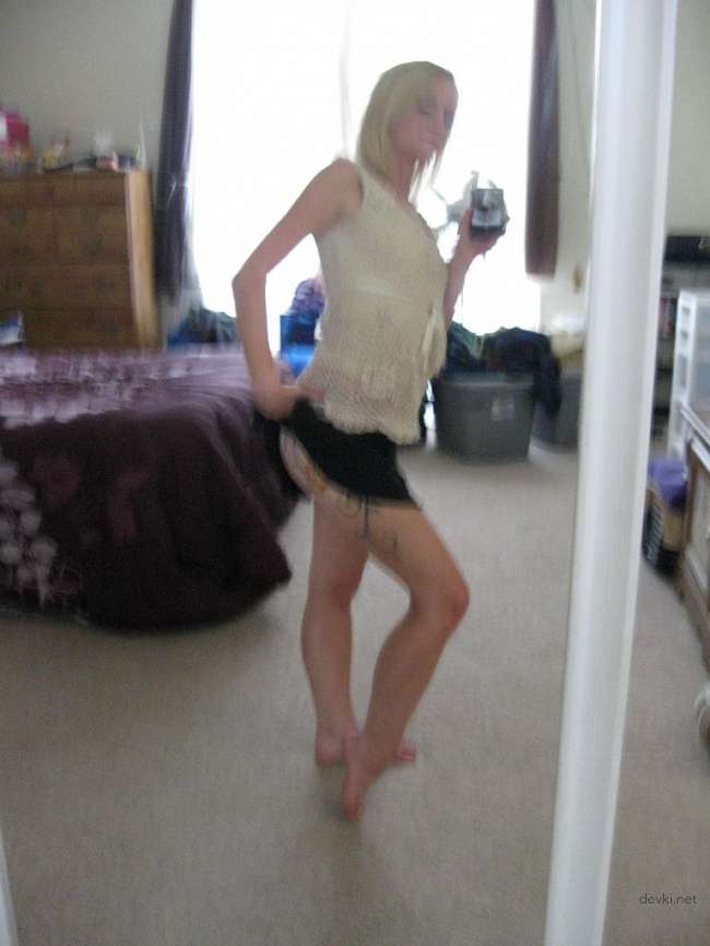 Blonde Tattooed Amateur Babe: Explicit Photo Collection