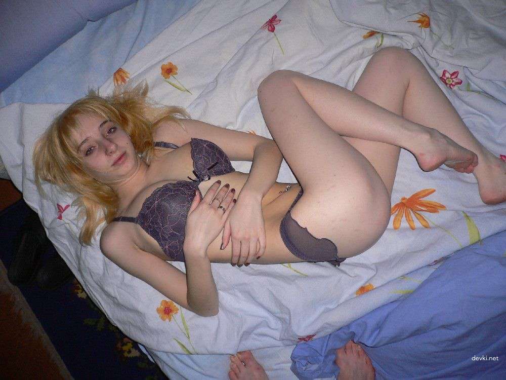 Big-Nippled Blonde Bombshell Strips Naked in Explicit Porn Photo