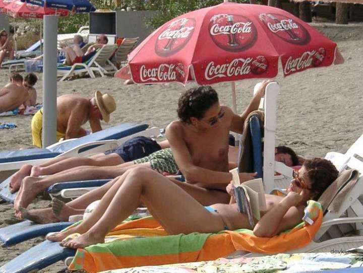Private Nude Beach Photos: Amateur Nudists Sunbathing Explicitly