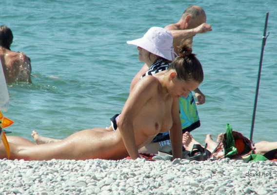 Private Nude Beach Photos: Amateur Nudists Sunbathing Explicitly