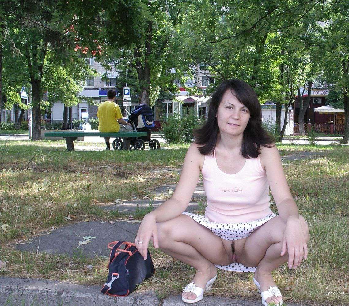 Woman Walking Nude in Public Street: Explicit Amateur Photo