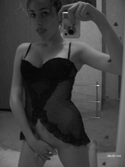 Amateur Brunette Captures Her Nude Body in Explicit Selfies