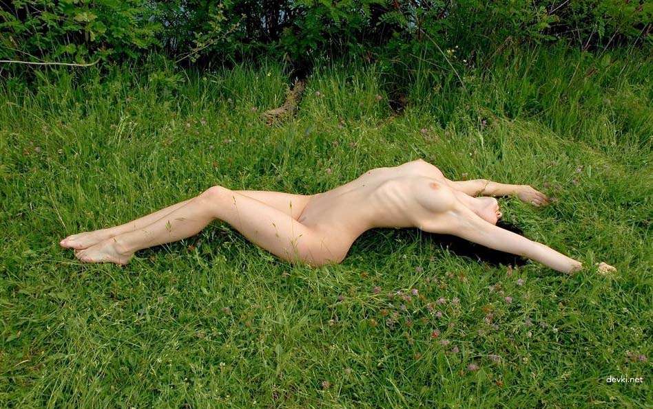 Amateur Nude Sunbathing in Nature: Explicit Outdoor Nudity