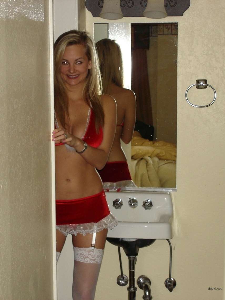 Hot babe poses seductively and sucks cock in explicit photo shoot