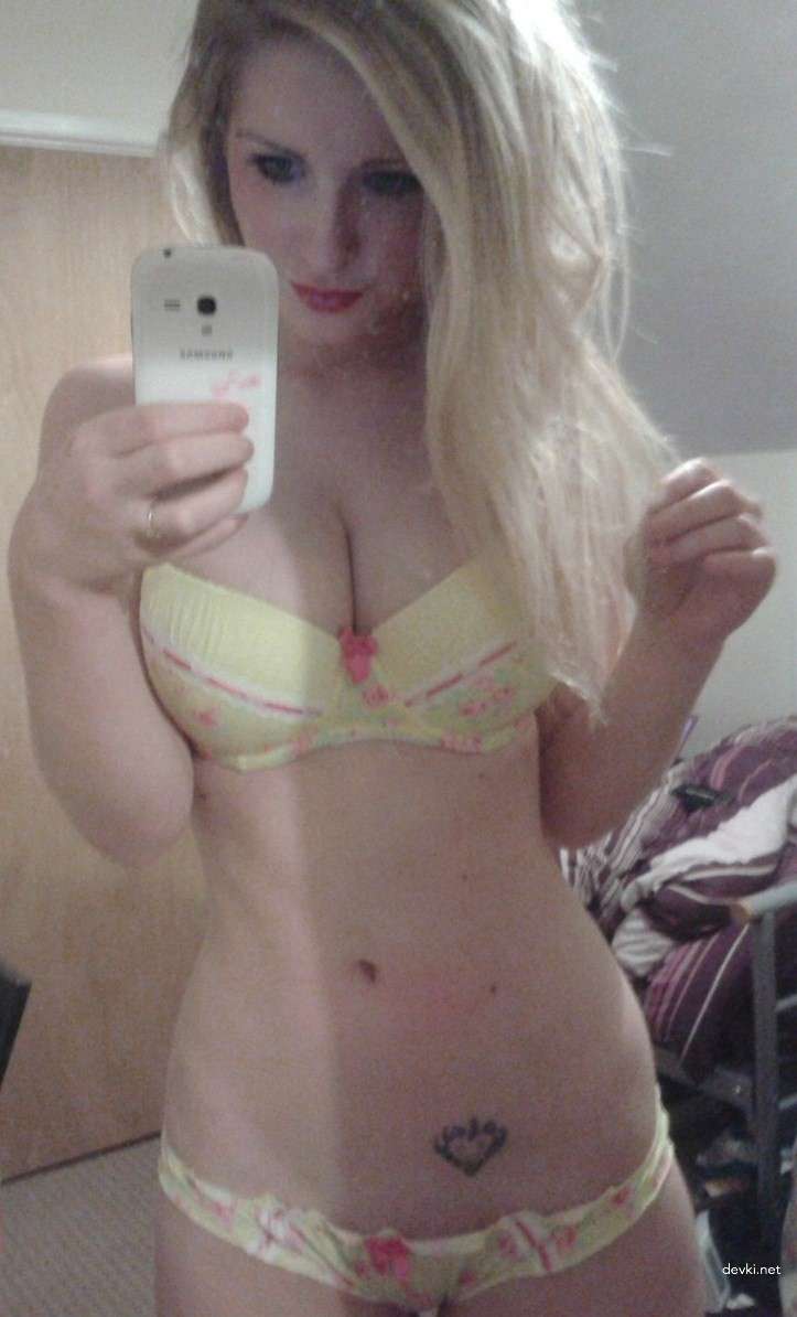 Sensual Blonde Amateur Erotic Photoshoot: Explicit Beauty in Soft Lighting