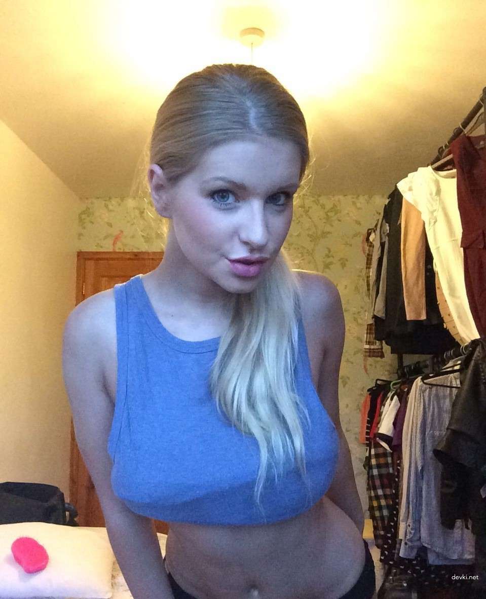 Sensual Blonde Amateur Erotic Photoshoot: Explicit Beauty in Soft Lighting