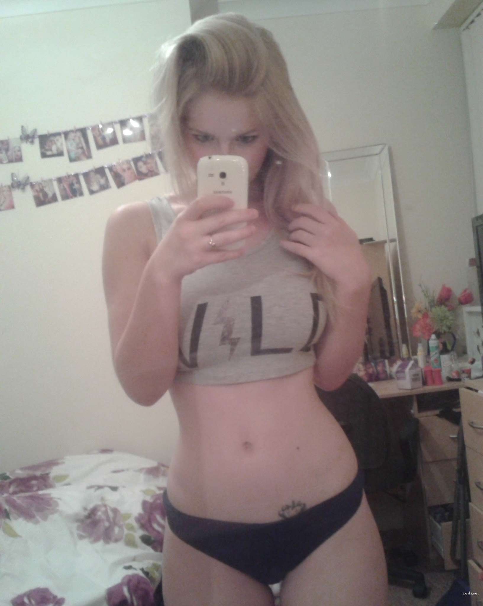 Sensual Blonde Amateur Erotic Photoshoot: Explicit Beauty in Soft Lighting
