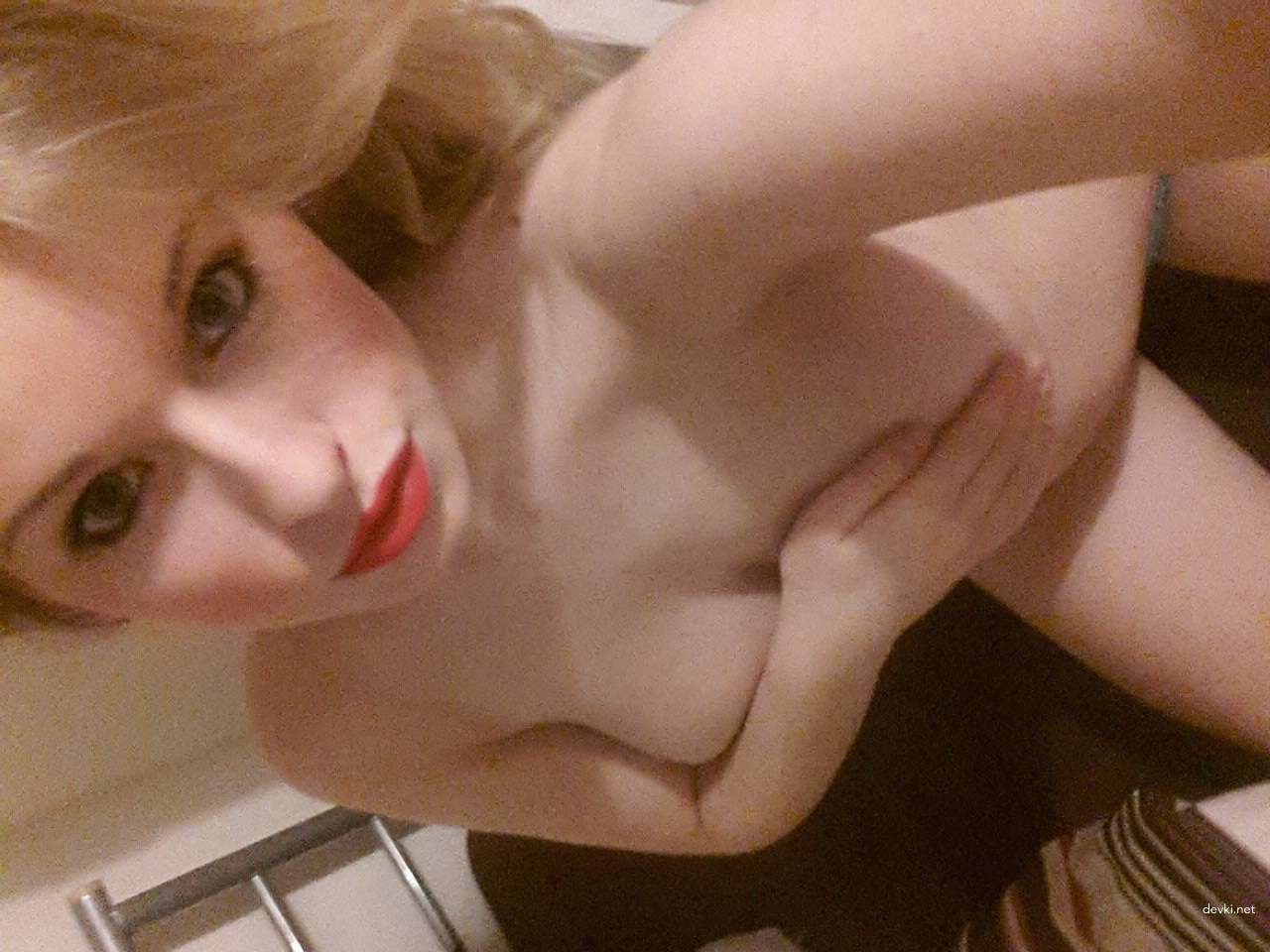Sensual Blonde Amateur Erotic Photoshoot: Explicit Beauty in Soft Lighting