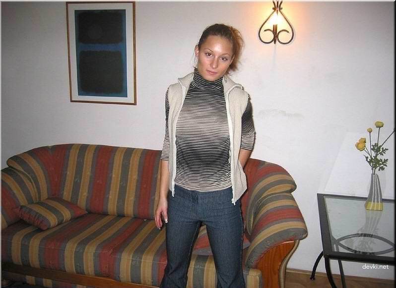 Svelte Blonde Amateur Poses Explicitly on Couch for Provocative Photoshoot