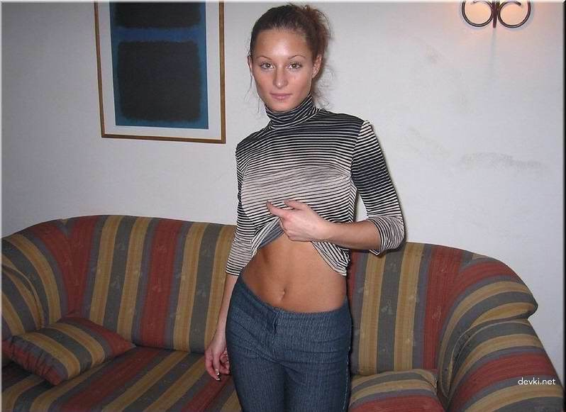 Svelte Blonde Amateur Poses Explicitly on Couch for Provocative Photoshoot
