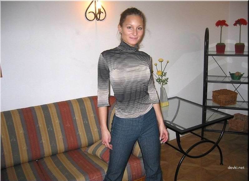 Svelte Blonde Amateur Poses Explicitly on Couch for Provocative Photoshoot
