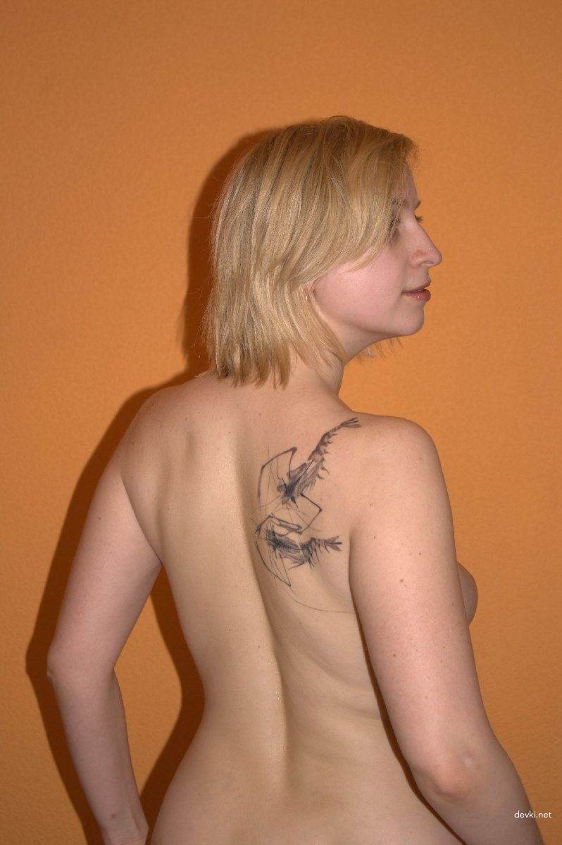 Amateur Babe Sexually Posing and Fondling Her Breasts